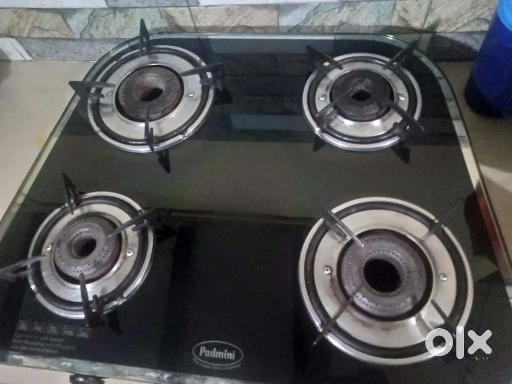 Four burner gase stove  tough glass  ok condition