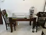 4 seater wooden dinning table with 4 chairs