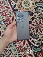 One plus 12r in mint condition with box charger and cable scratch less