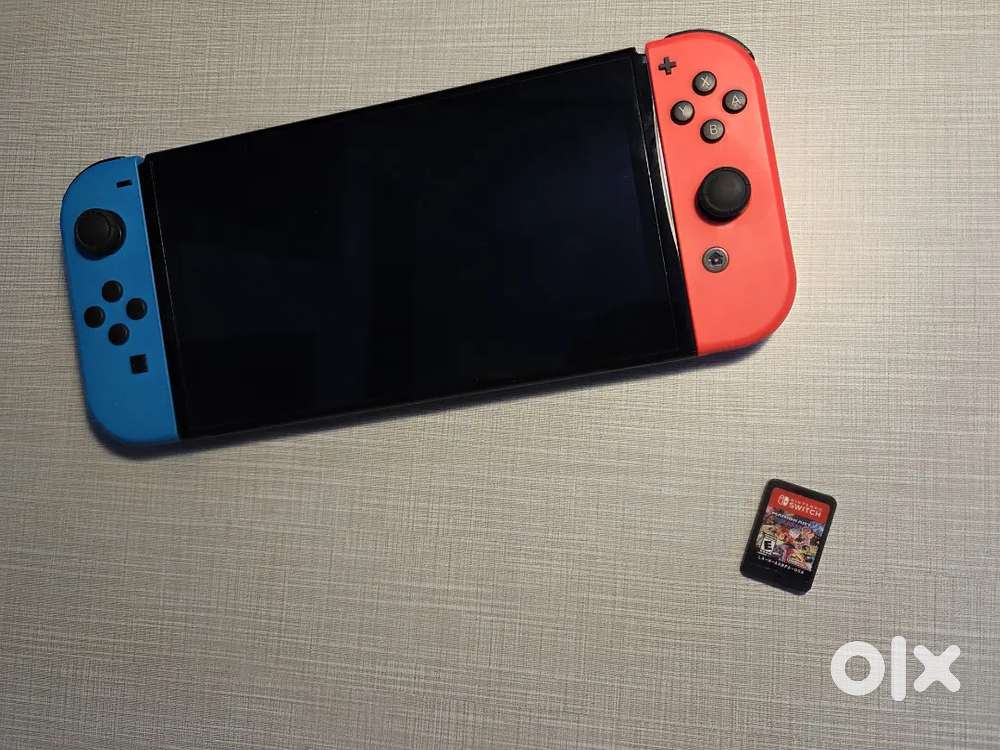 Nintendo Switch OLED (Box + Accessories + Mario Kart Game)