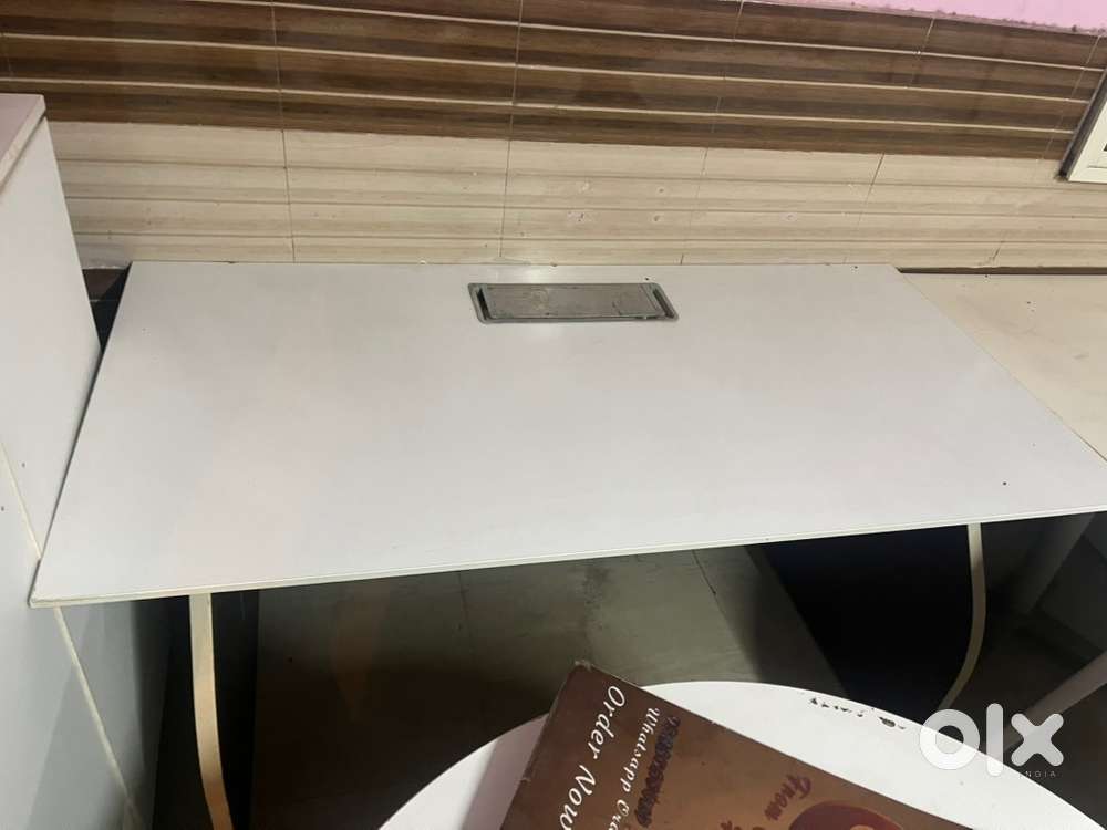 White Office table with inbuild wire slort for junction box