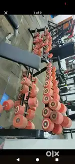 Gym setup complete with mat mirror fan counter chairs every thing comp