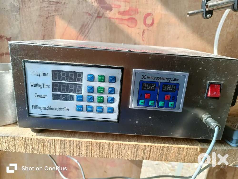 LIQUID FILLING MACHINE