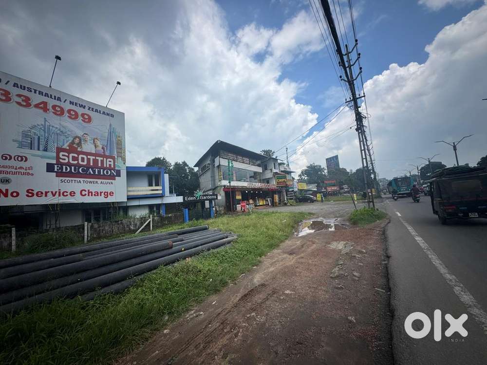 11 cent commercial land for sale at Aluva Thottakkatukara NH frontage