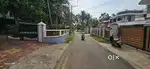 Kumbanad near tar road frontage 23 cent house plot for sale.