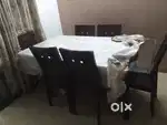 Dining table with 6 wooden chair