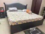 King size bed with mattress and bed side table