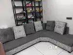 5 seater sofa in good condition  grey colour along with cushions