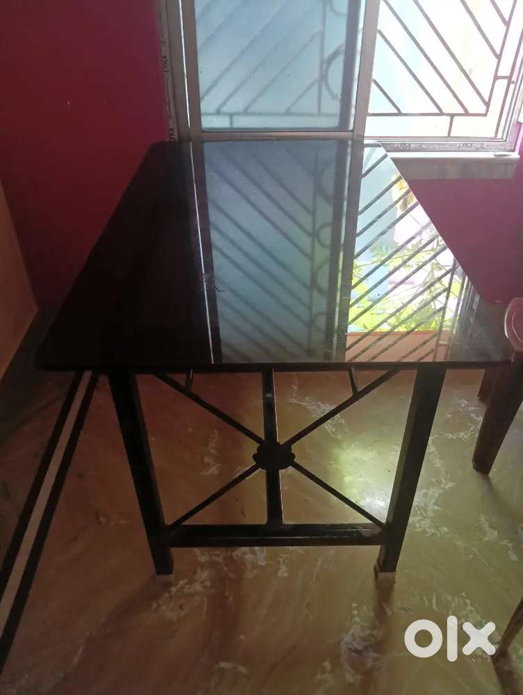 Dining table almost new +2 chair Available