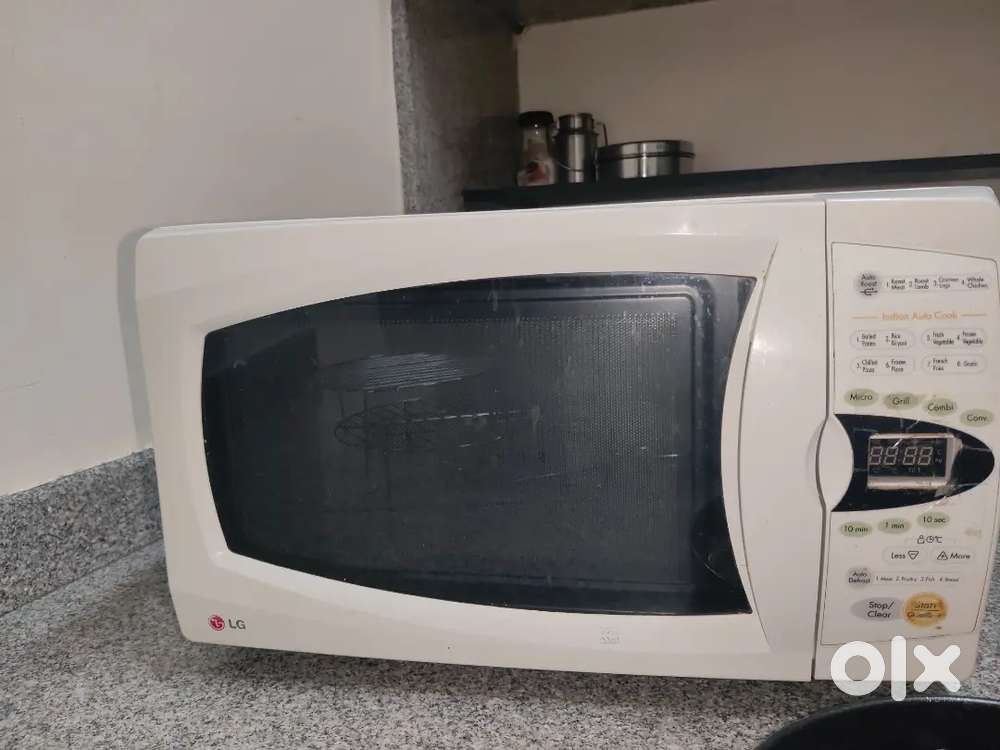Lg microwave oven, working all features and has all essential tools