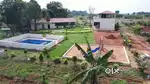Peaceful farmland living with 15+ premium amenities, limited plots.