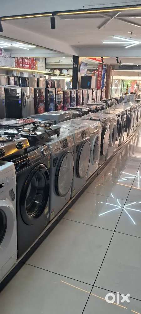 Staff at furniture and electronics shop