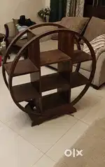 Double bed, chest of drawers, circle showcase