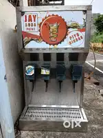 Soft drink vending machine