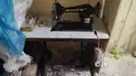 Working sewing machine with motor