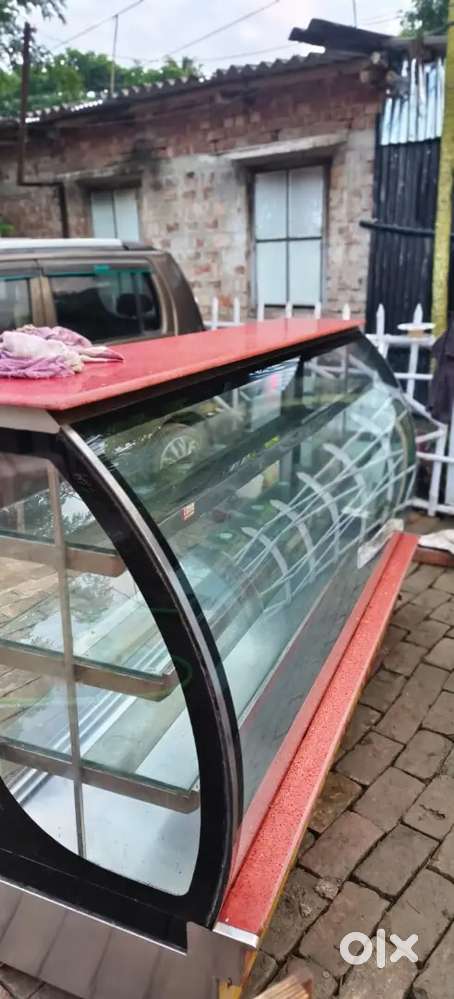 Sweet shop cake pastry display counter showcase 9 month old