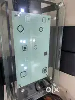 GLASS DINNING TABLE