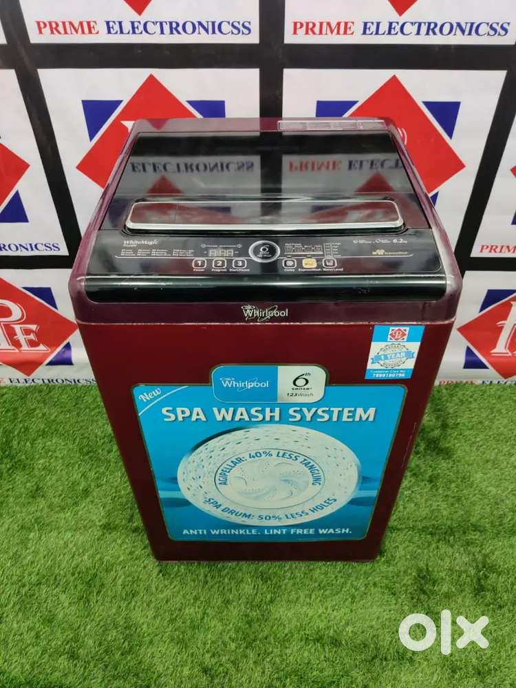 ~•√ Working condition off Whirlpool maroon royal with six months free