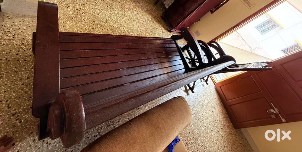 Wooden sofa with rocking chair