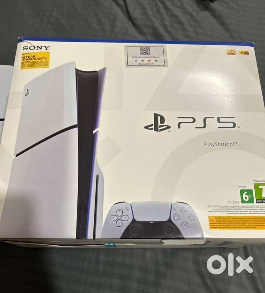 PS5 SLIM WITH 4 GAMES 1 TB