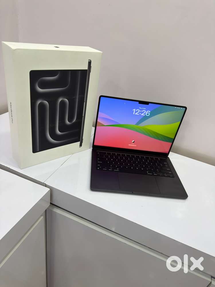 MacBook Pro M3 14-inch with. M3 Pro chip open bix