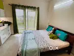 Urbanladder sheesham wood king size bed