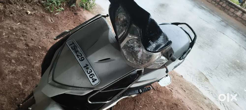 A white duet scooty with all conditions u can burgain