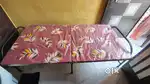 Folding bed with mattress