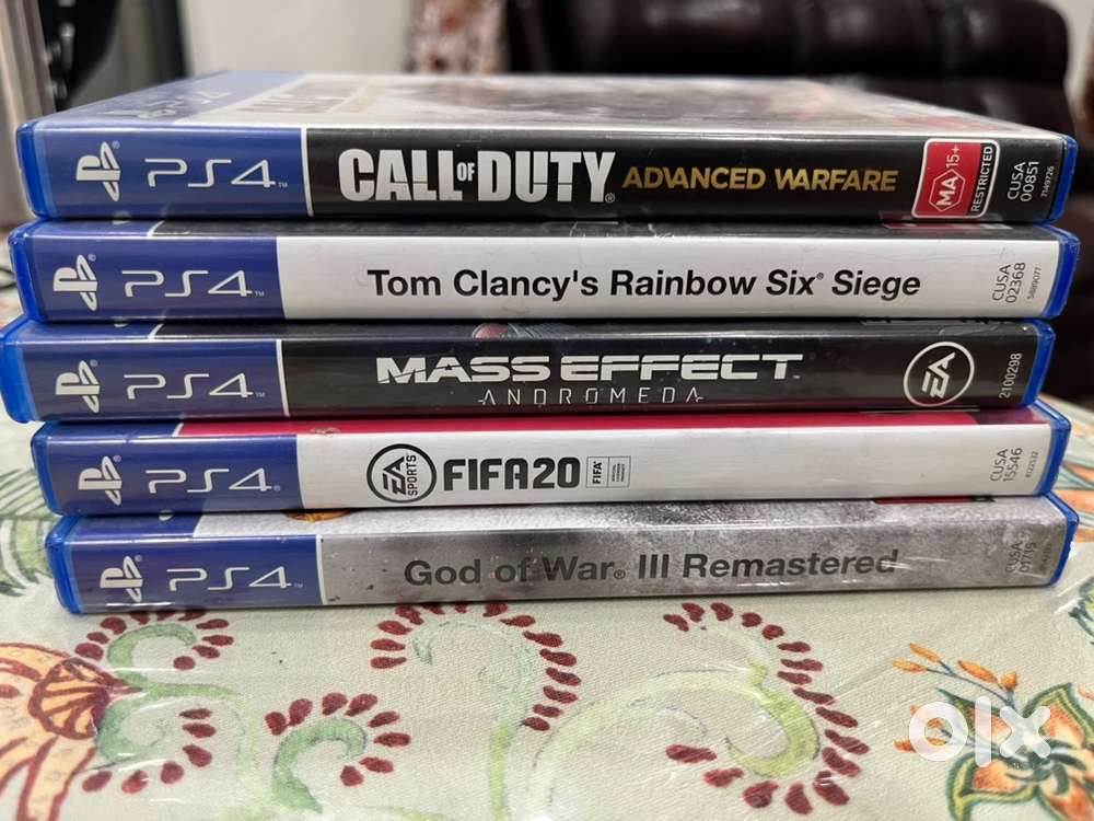 Sony PS4 Std. Edition, in working condition. 2 controllers & 5 games