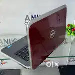 Dell Inspiron 5520 laptop with small display damage