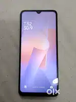 Redmi 12C phone with box and charger