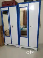 2 metal cupboards and 2 plywood bed