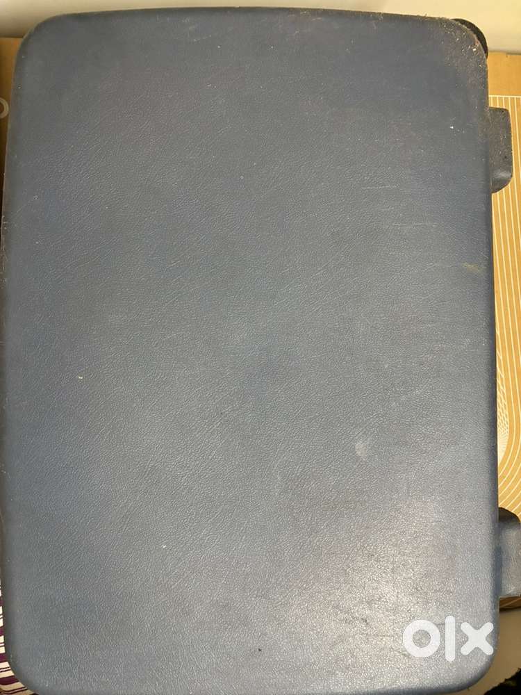 A vintage hard shell suitcase -durable and spacious