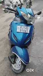 Honda activa , blue colour.