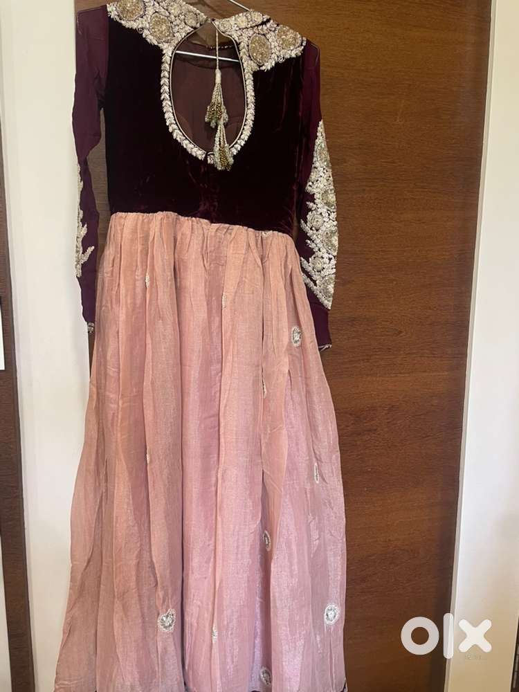 Heavy neckline with velvet yoke and shimmer fabric gown