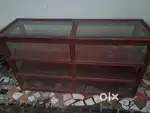 Glass shelf with wooden frame