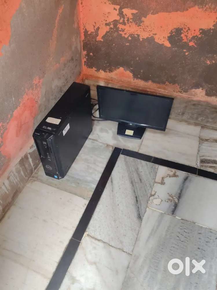 Monitor and CPU with keyboard and mouse