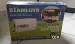 Simon Digital Voltage Stabilizer New With Box Packing.