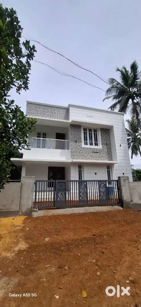 A SUPERB NEW 3BED ROOM 1400SQ FT HOUSE IN KOTTEKKAD,THRISSUR