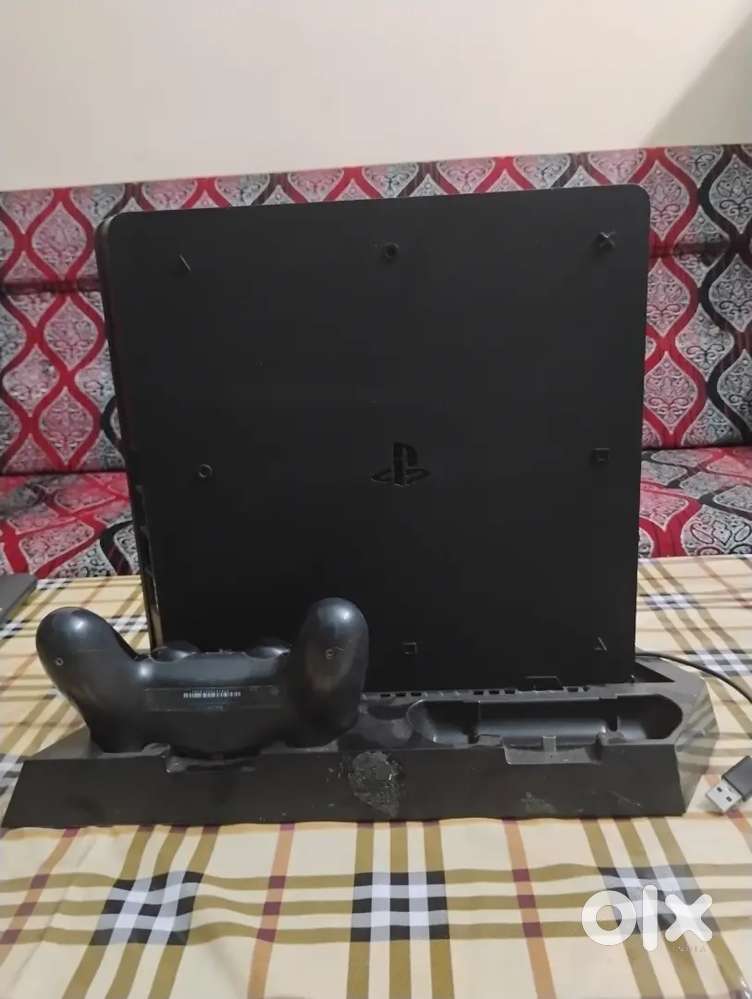 PS4 with remote and stand