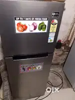 Double door fridge with warranty and good condition