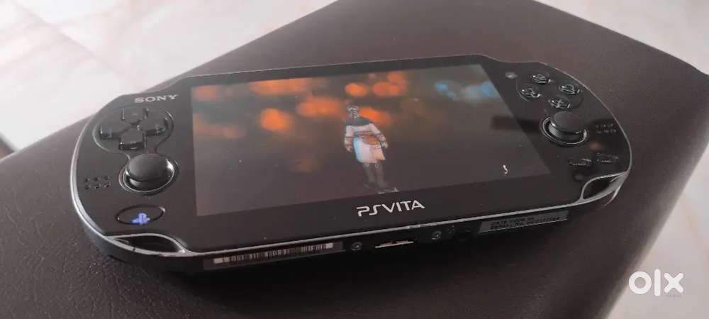 PS VITA OLED 128GB WITH GAMES WARRANTY