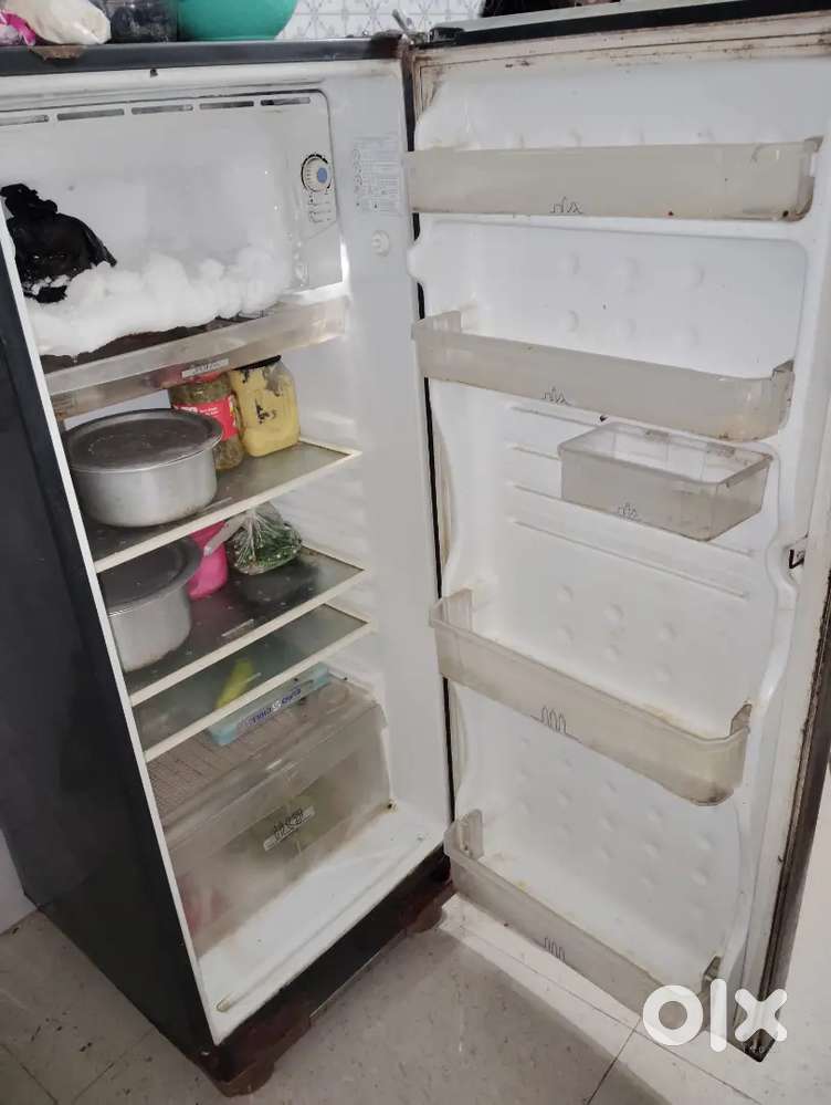 Single Door Refrigerator and Iron Bed