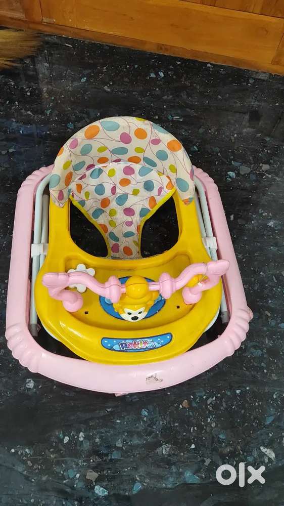 Baby wheeler/walker new one and baby carry bag