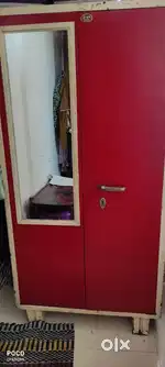 Cupboard and metal bed
