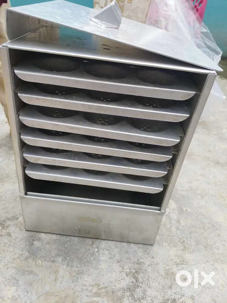 Idly steamer with 54 ildy cavities
