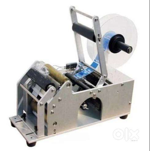 BOTTLE STICKERING MACHINE