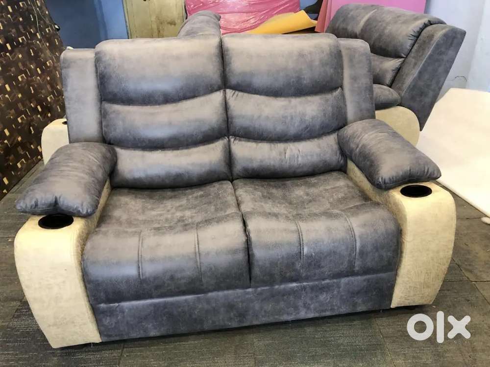 NEW MANUFACTURING 2 SEAT RECLINER WITH CUP HOLDER AT ZAM ZAM FURNITURE