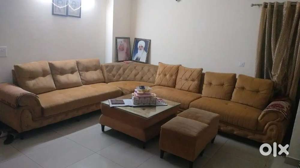 10 seater Sofa with 2 Ottoman and center table.