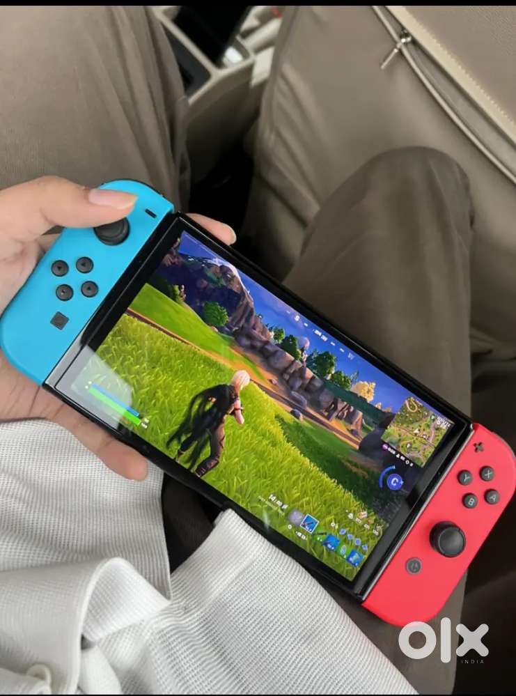 Nintendo Switch OLED with Joy-Con Gaming Console - Neon Blue and Red